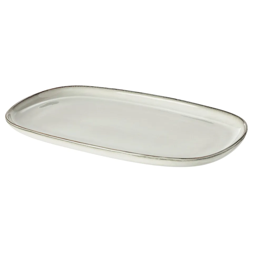 White GLADELIG ceramic serving plate, sand-glazed, oval shape, smooth edges, classic design.
