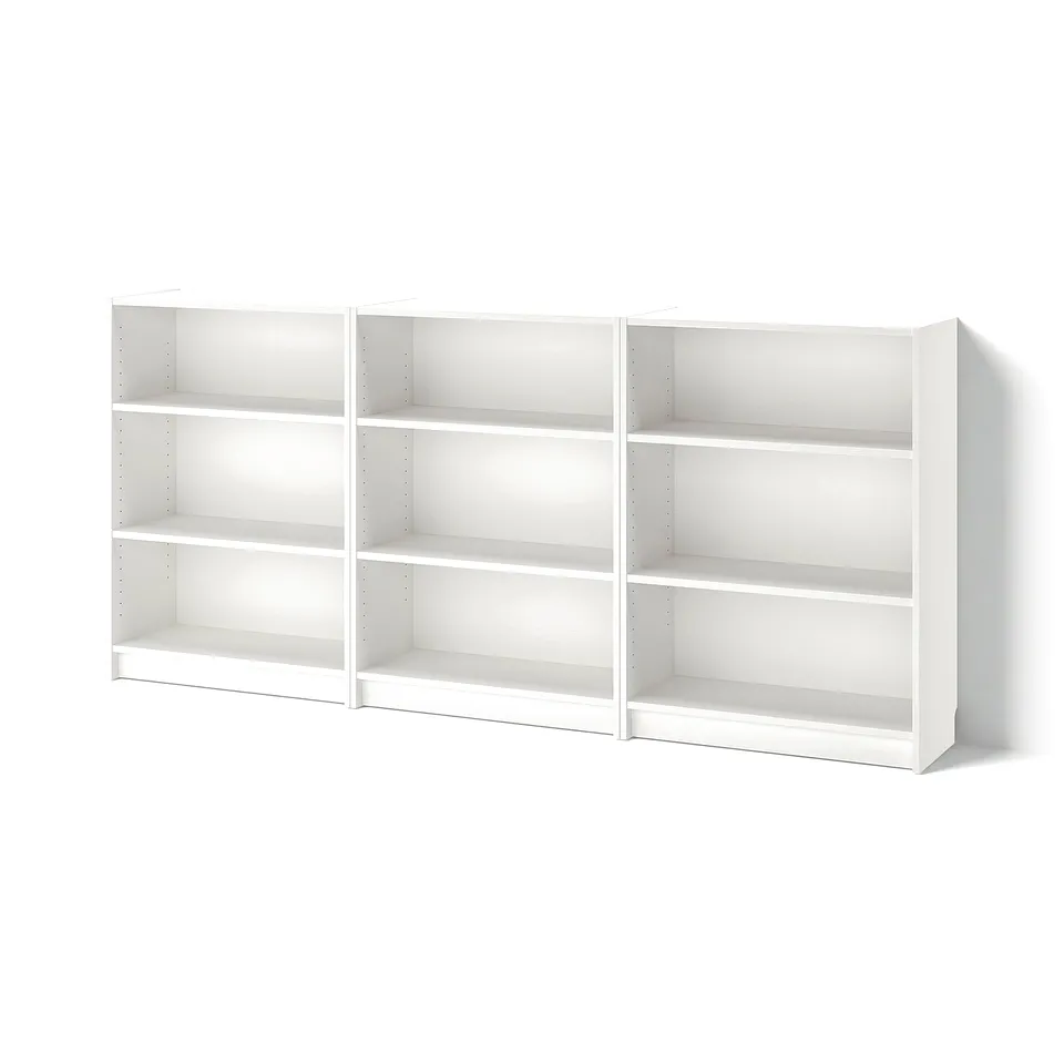 Three white BILLY bookcases with adjustable shelves, clean and minimalist design.