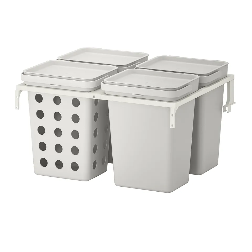 HÅLLBAR waste sorters: white plastic bins, ventilated, three with lids, one open, mounted on frame.