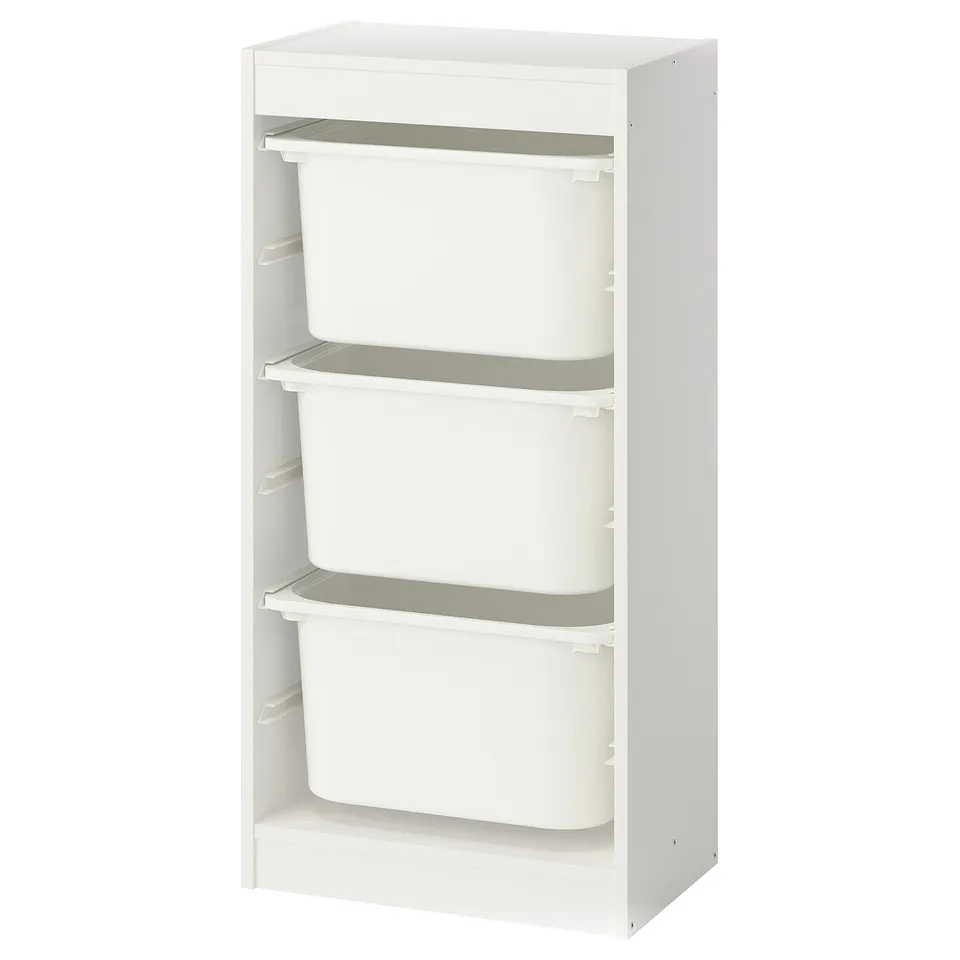 A white TROFAST storage unit with three removable bins, ideal for organising childrens rooms.