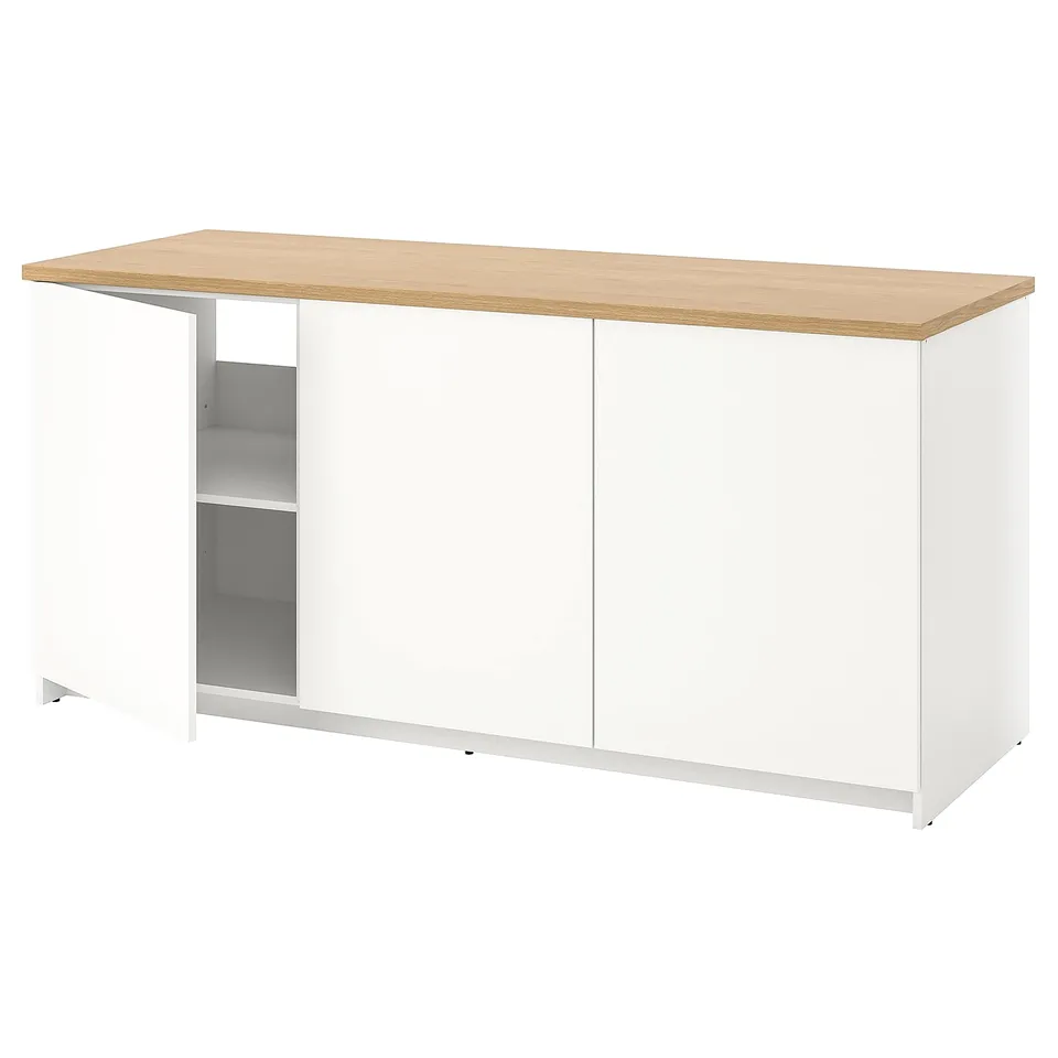 A KNOXHULT white modular kitchen cabinet with light wood countertop.