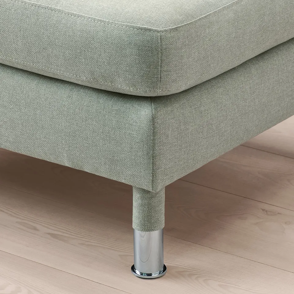 Modern grey fabric footrest with chrome leg, showing clean design and sturdy construction.