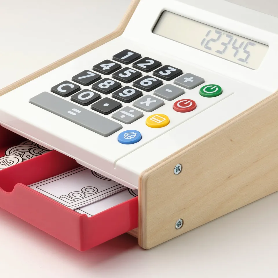 Toy cash register with calculator, colourful buttons, and pretend play money.