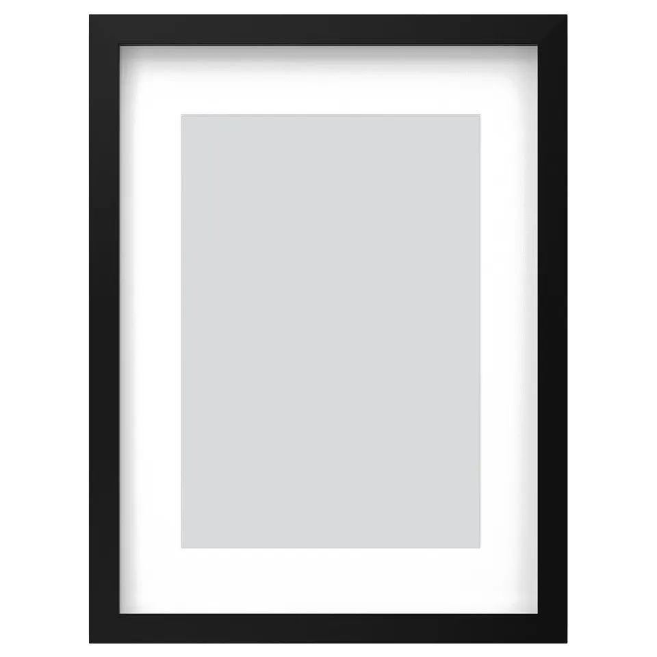 Black RÖDALM picture frame, classic rectangular design with white inner mat.