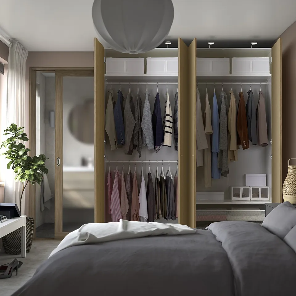 Modern wardrobe with clothes and storage
