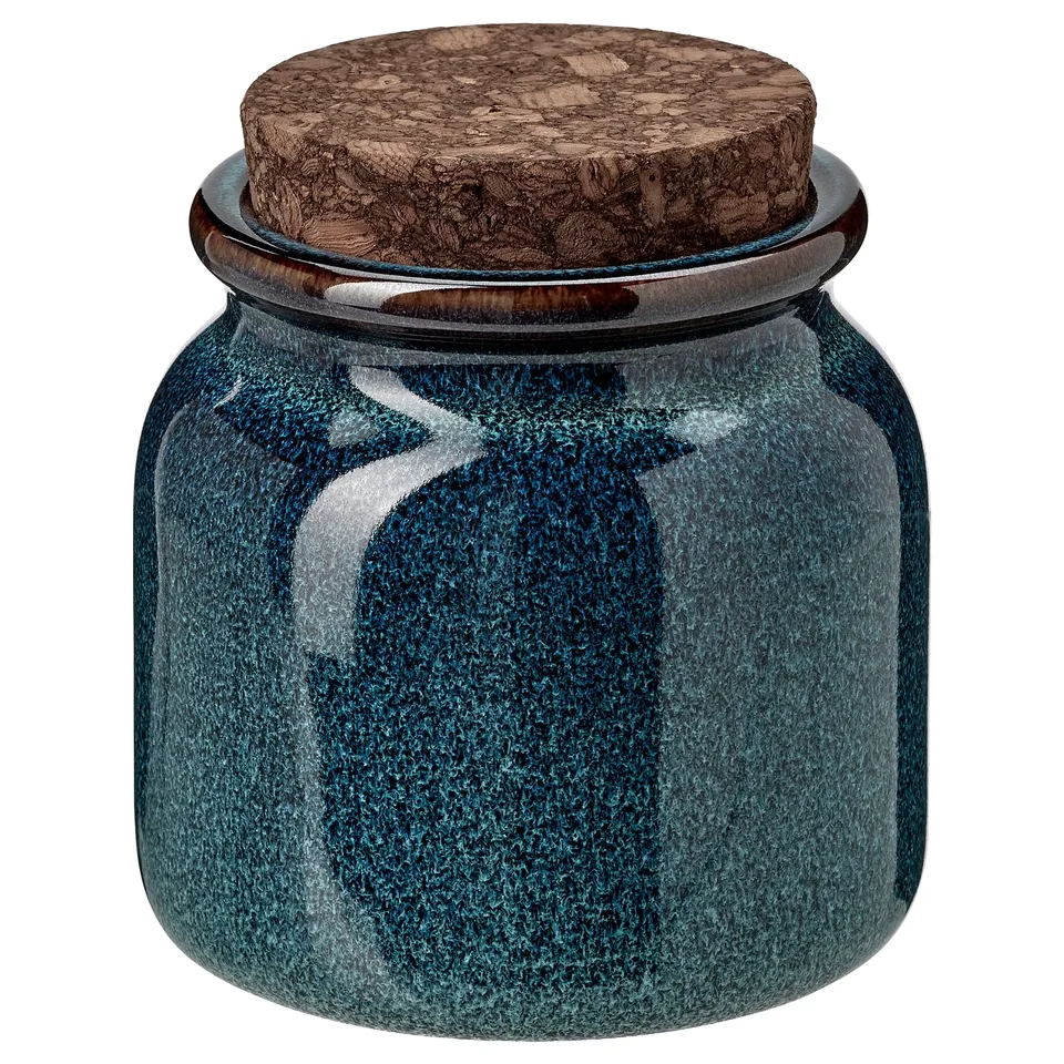 BRUGDHAJ jar with cork lid, teal glaze, round body, rustic stoneware with glazed surface.