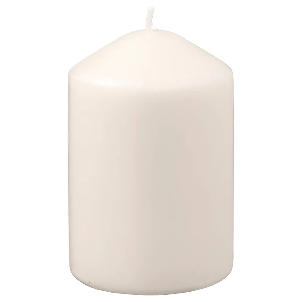 White LÄTTNAD pillar candle with smooth round shape; plain design.
