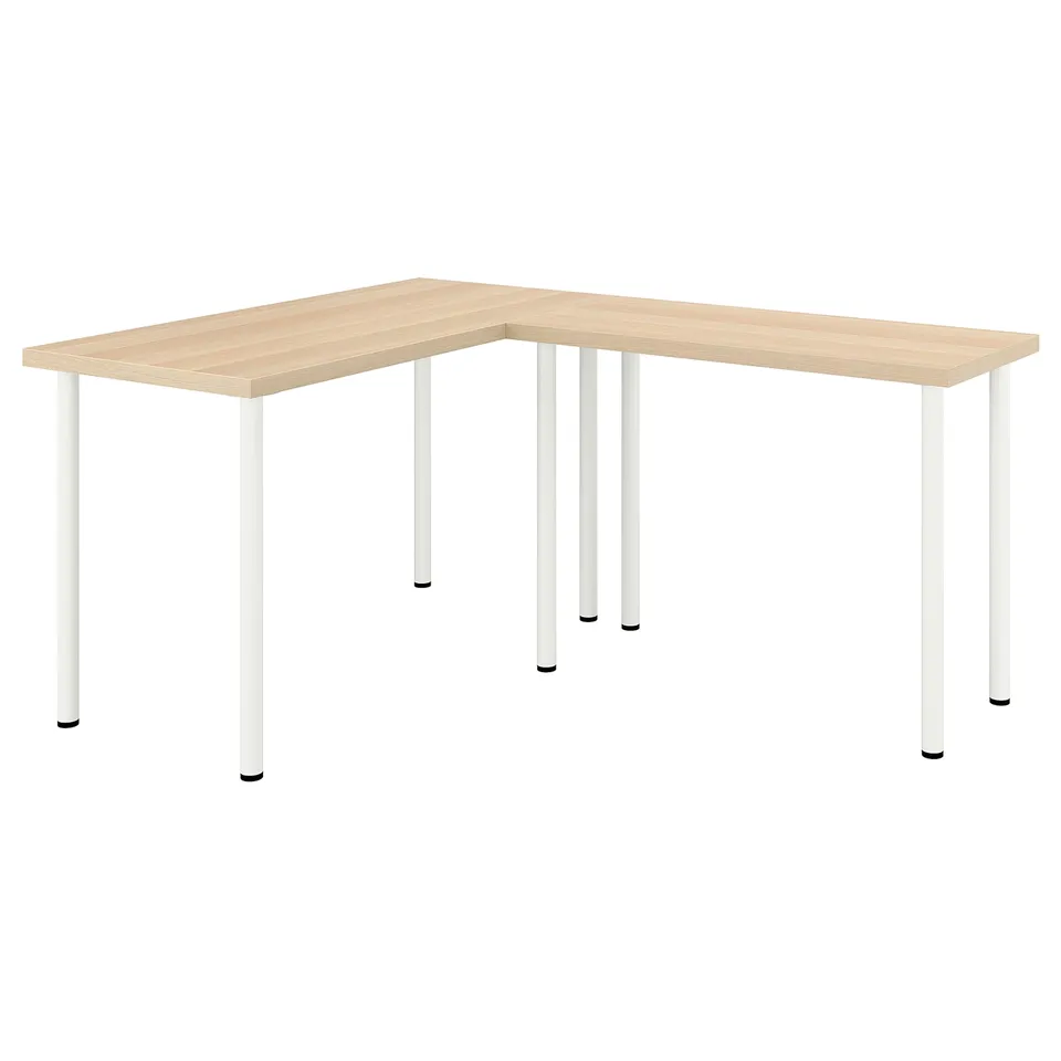 LAGKAPTEN, l-shaped corner desk with light wood top and white metal legs. Modern, minimalist design; ideal for small spaces.