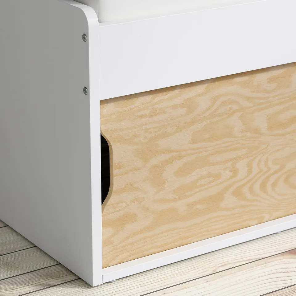 Modern kids bed with sleek white frame, natural wood panel, and smooth sliding door.