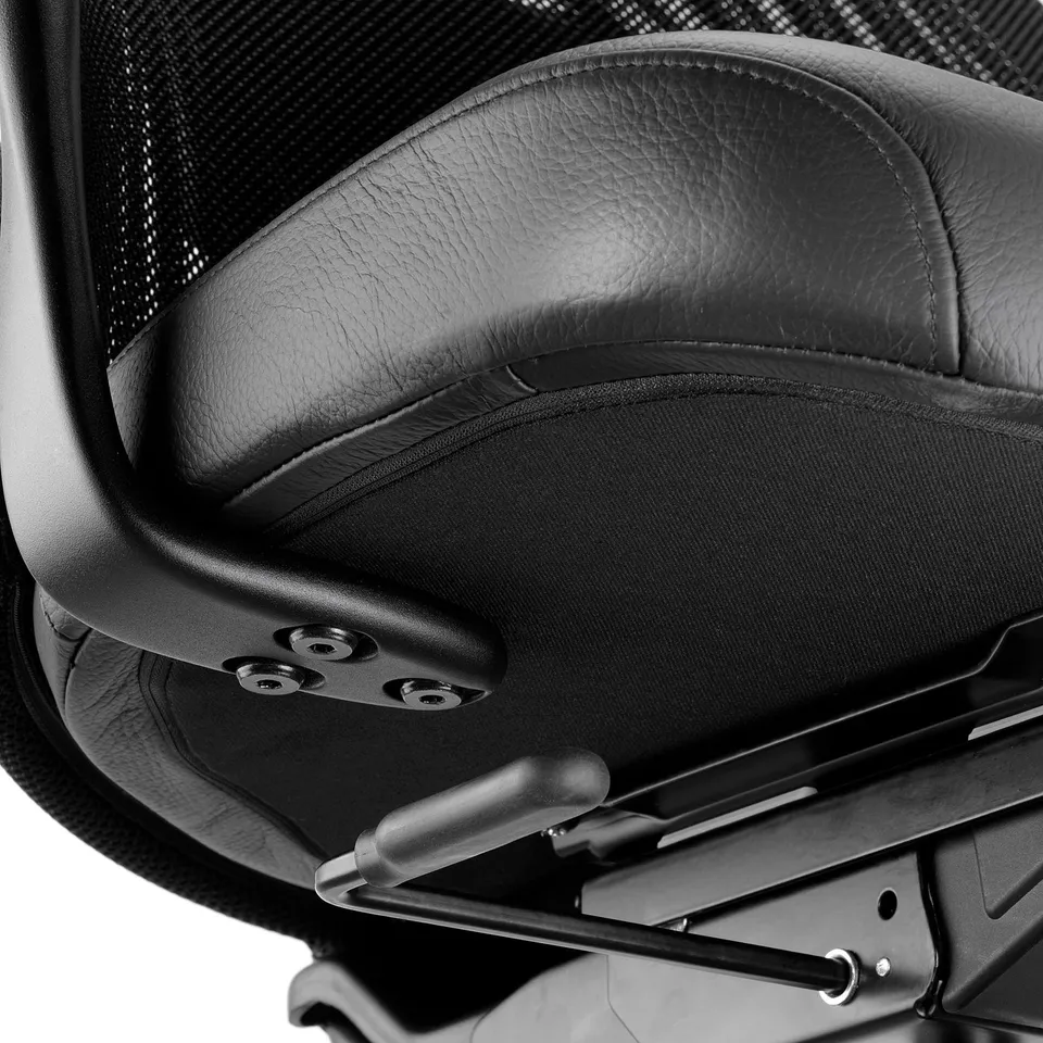 Ergonomic office chair closeup. Luxe leather seat, mesh back, adjustable.