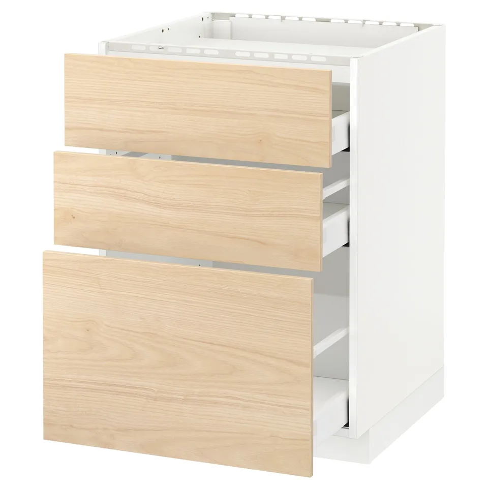 White METOD kitchen unit with three light ash wood drawers, partially open.