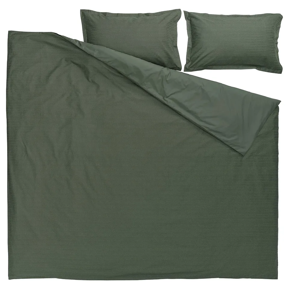 Dark green LUKTVICKER duvet & pillowcases, 100% cotton waffle weave.