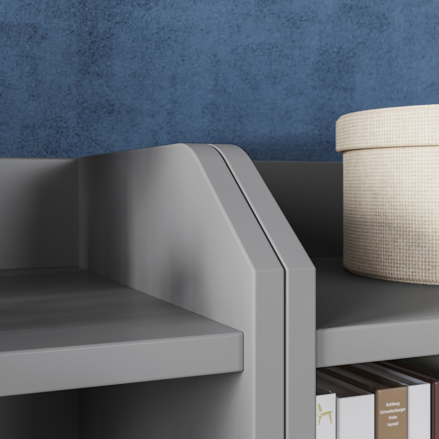 Grey HAUGA storage unit with shelves and woven basket on top.