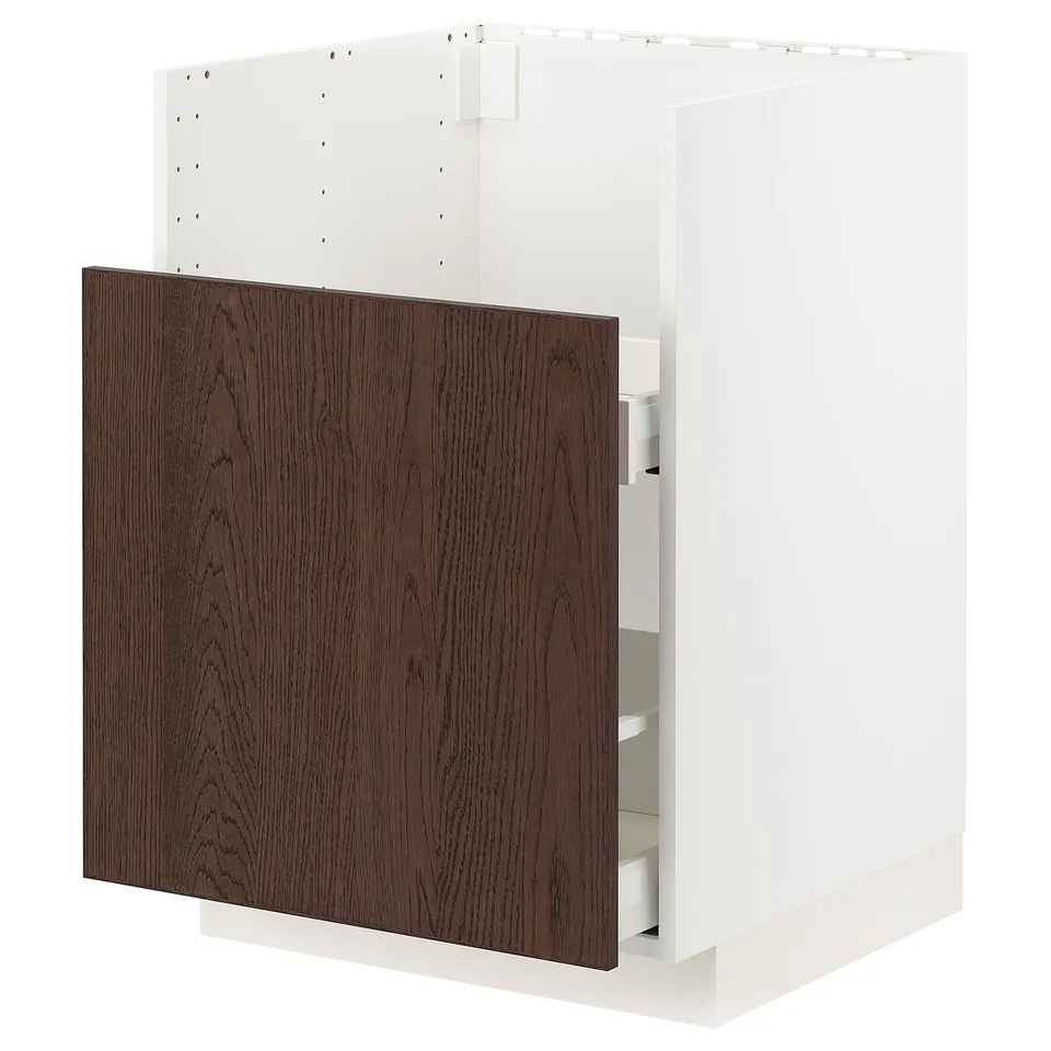 A white METOD kitchen cabinet with dark brown sinarp drawers, featuring a sleek and modern design with wooden accents.
