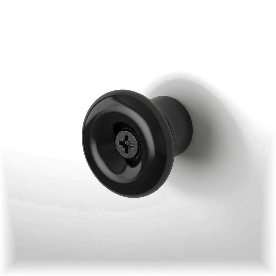 Black round wall hook, glossy, modern, minimalist-style.