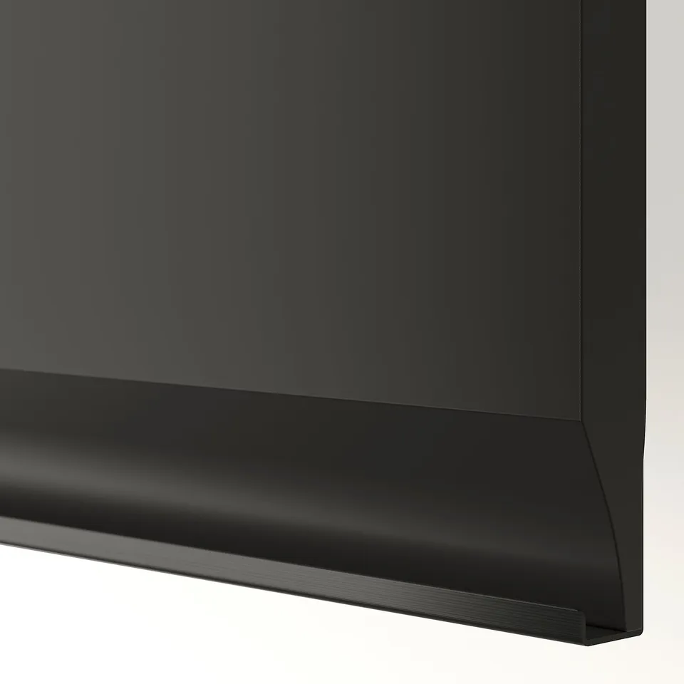 Close-up of sleek, black, modern storage units edge, showing high-quality finish.