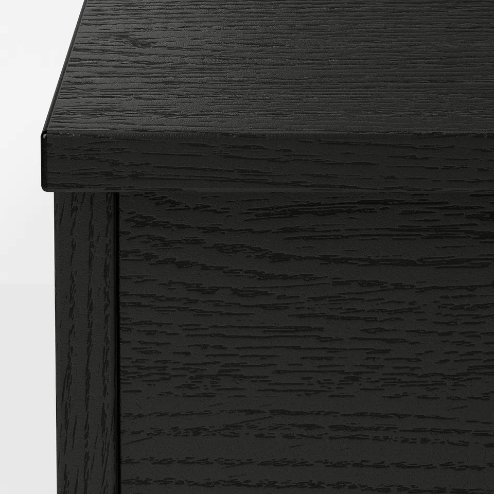 Modern black coffee table with sleek design and storage. Clean lines and quality finish.