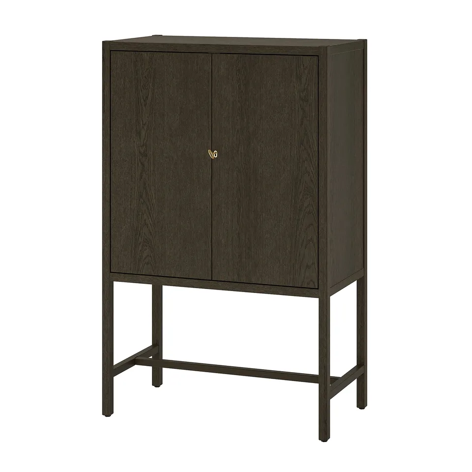 STOCKHOLM 2025: dark wood cabinet with brass key, adjustable shelves, soft-close doors.