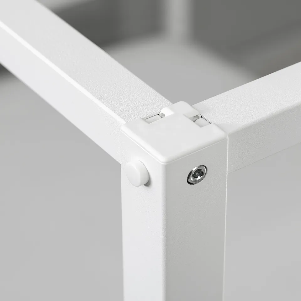 A corner joint with screws for VITARNA bed.