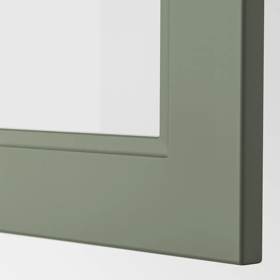 Close-up of smooth, sturdy green cabinet corner, showing modern design and fine finish.