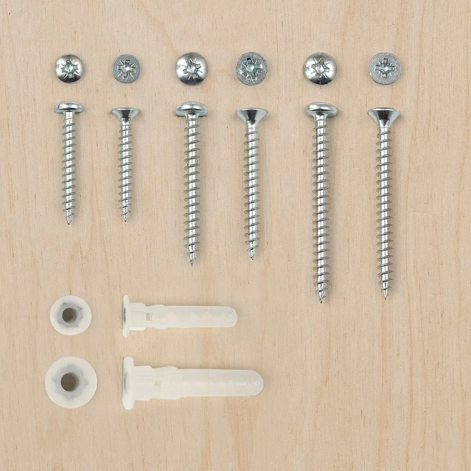 TRIXIG set: screws, wall plugs, plastic box. Silver screws vary in type; white plugs match box. Clean, organised design.