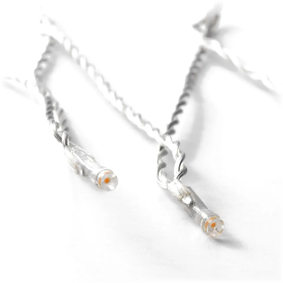 Close-up of two twisted led light strands, showcasing clear, bright bulbs connected by clear, flexible wires.