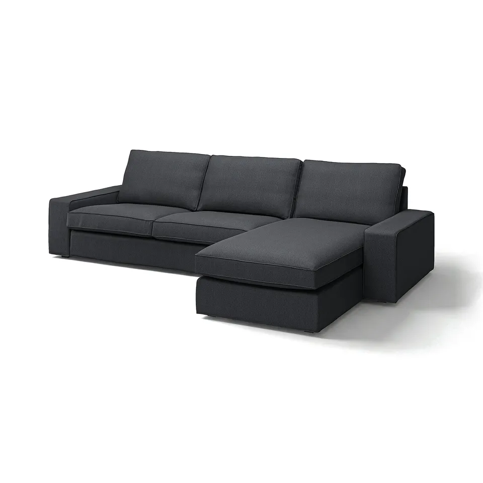 Dark grey sectional sofa with modern design, deep cushions, and removable armrests. Perfect for lounging and relaxation.