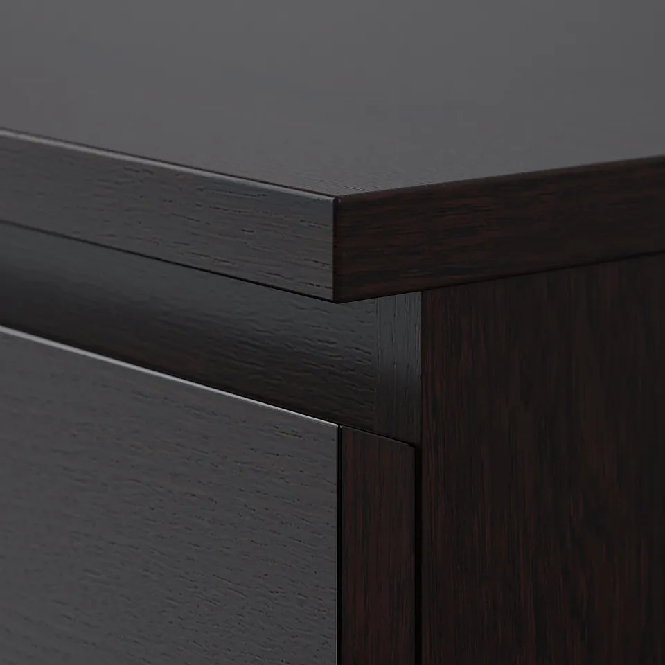 Dark wooden drawer detail; smooth, polished finish; clean lines; sturdy craftsmanship.