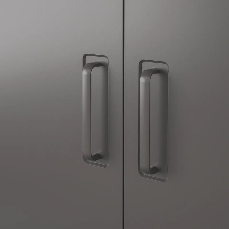 Dark grey metal drawer handles on smooth textured cabinet doors. Modern and sleek design, indicating high-quality craftsmanship.