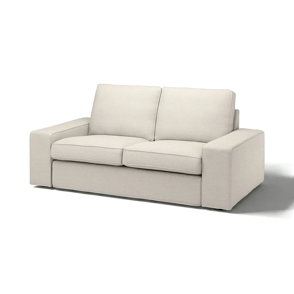 A light-colored KIVIK sofa with a modern, minimalist design, featuring plush cushions and clean lines.