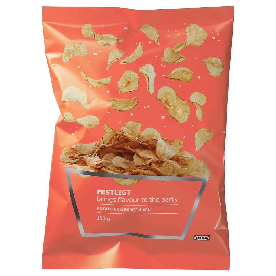 IKEA FESTLIGT snacks bag. Potato crisps with salt. Bright orange packaging, crunchy food inside.