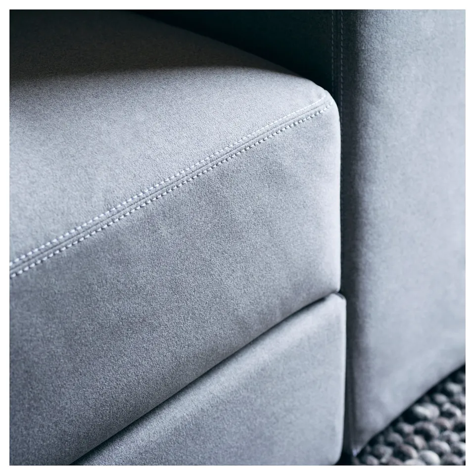 Close-up of JÄTTEBO sofas grey, soft, modern design with upholstery in recycled polyester.
