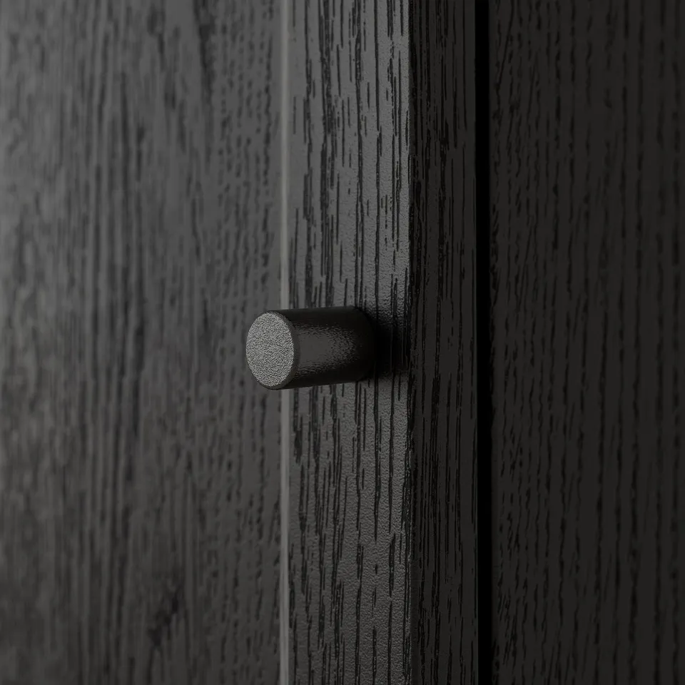 Dark wooden drawer edge, smoothly finished, reflecting quality craftsmanship.