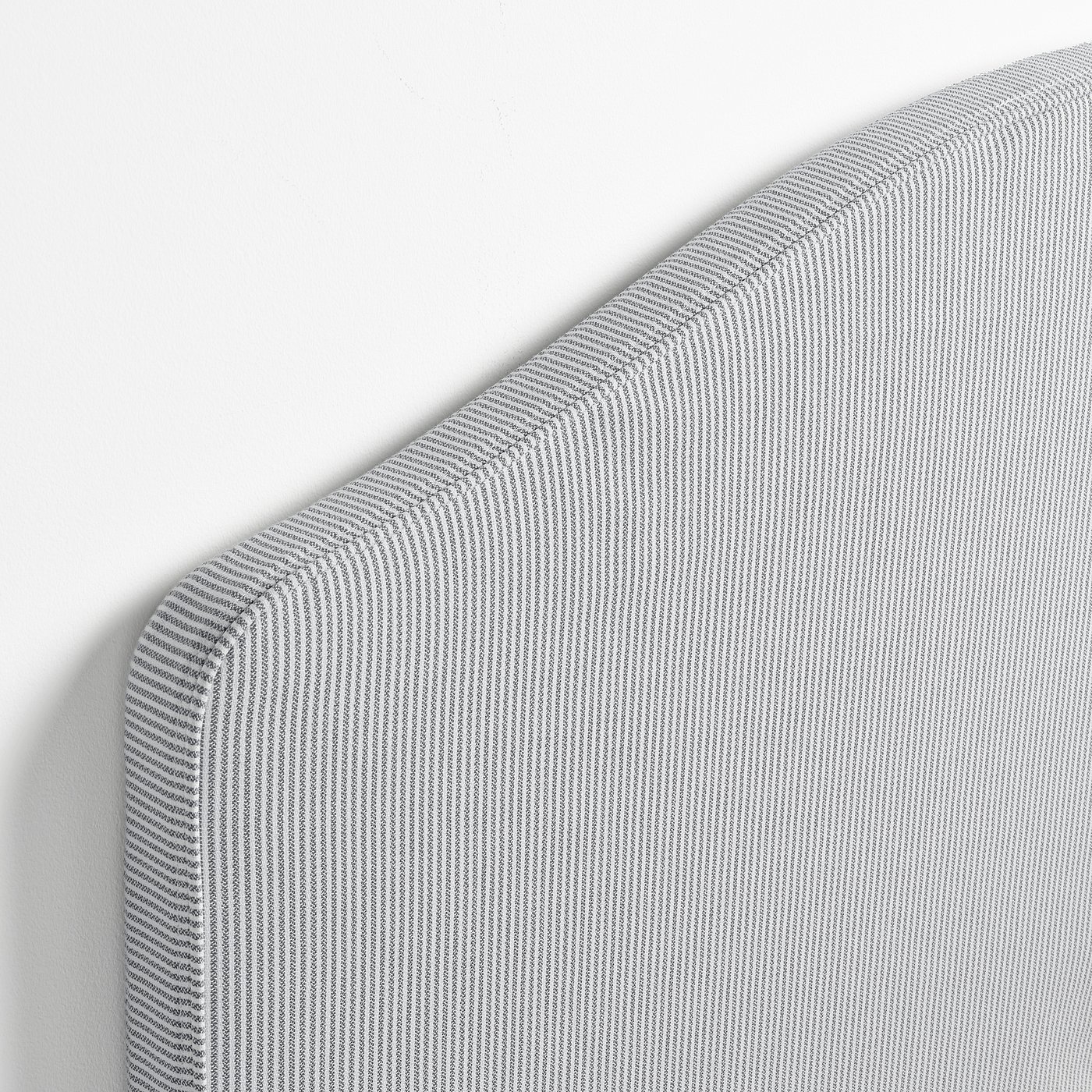 Close-up of RAMNEFJÄLL beds striped, textured fabric showcasing quality stitching and design.