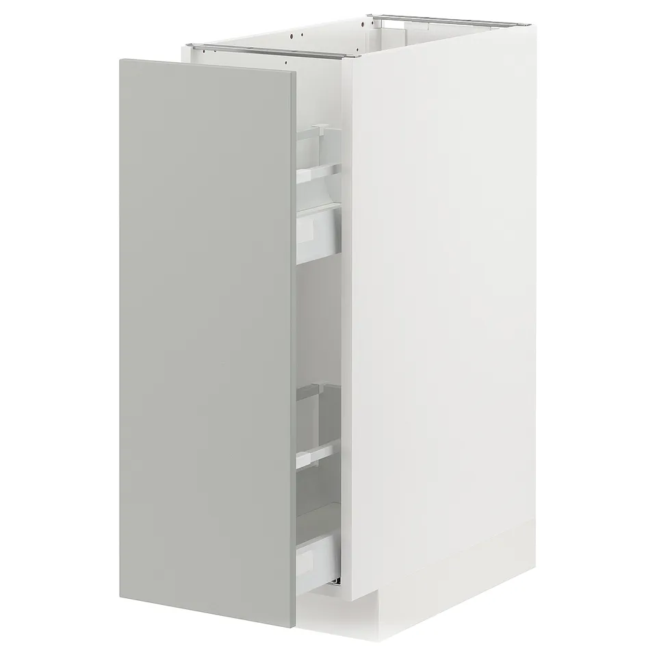 A modern white kitchen cabinet with a pull-out shelf. It sleek, light grey havstorp doors and offers a minimalist design.