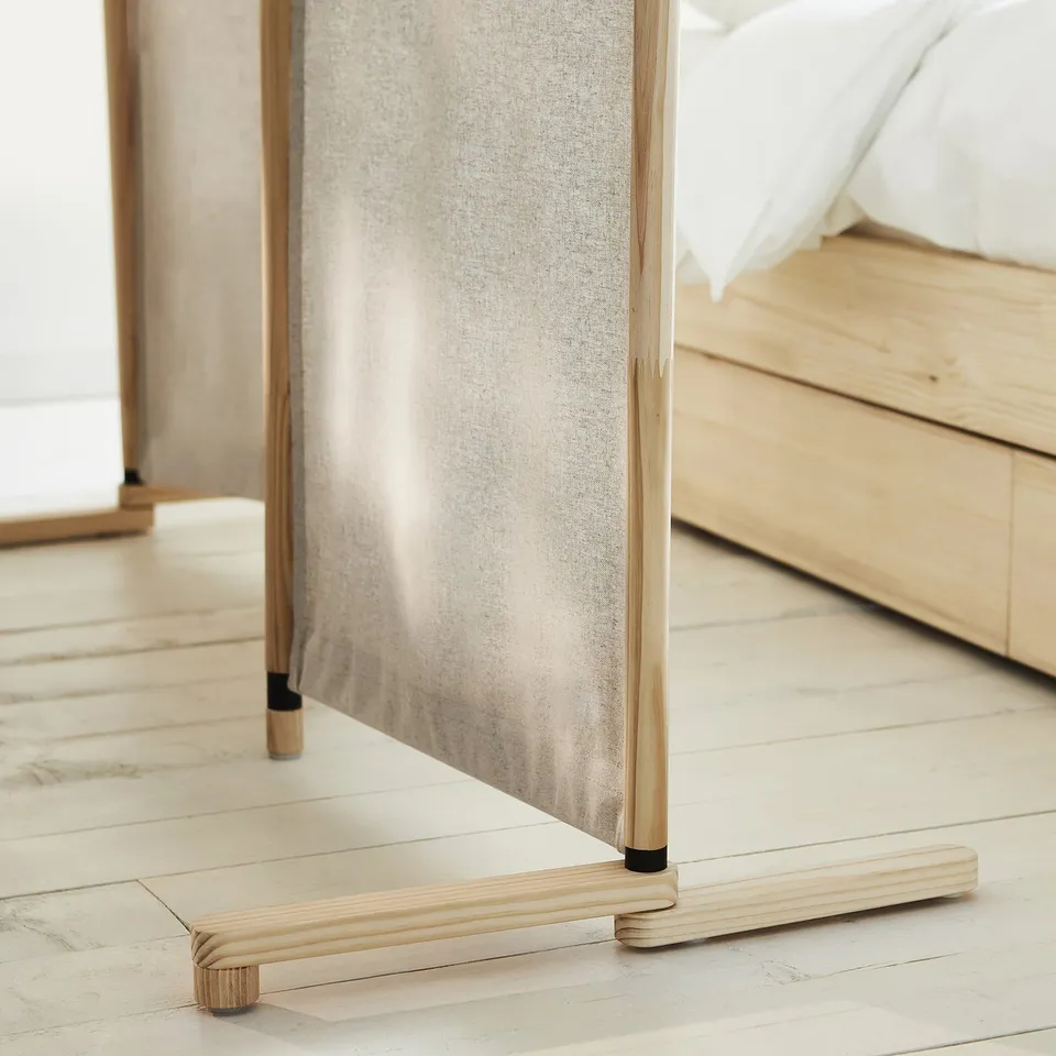 Wooden room divider, beige fabric. Lightweight, folds easily.