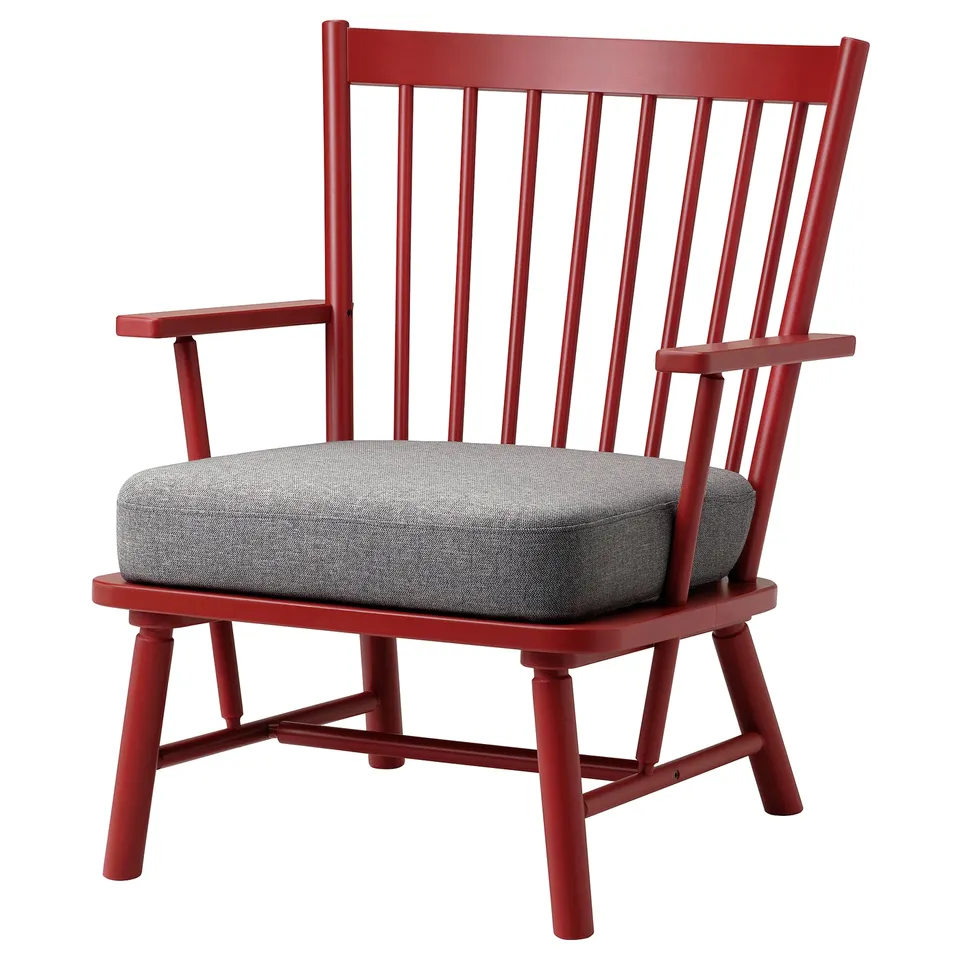 Red PERSBOL armchair with grey cushion, classic spindle design, wooden frame.