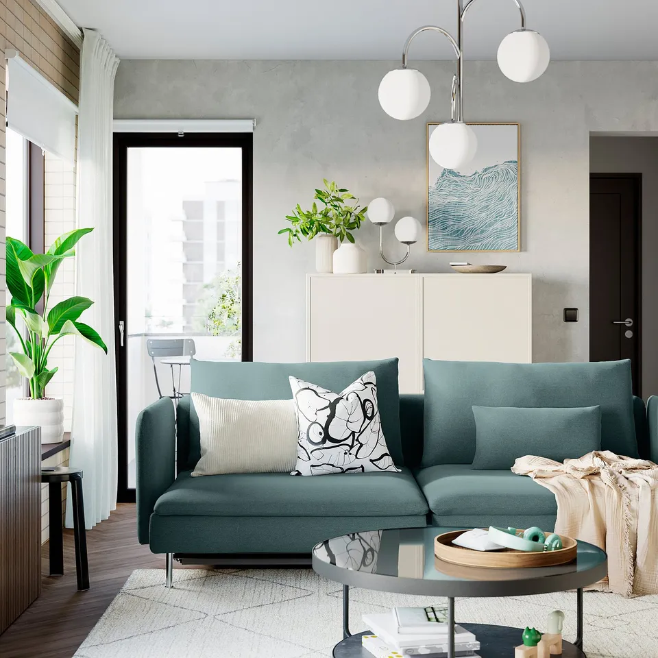 Modern living room with SÖDERHAMN sofa, pendant lights, and abstract art.