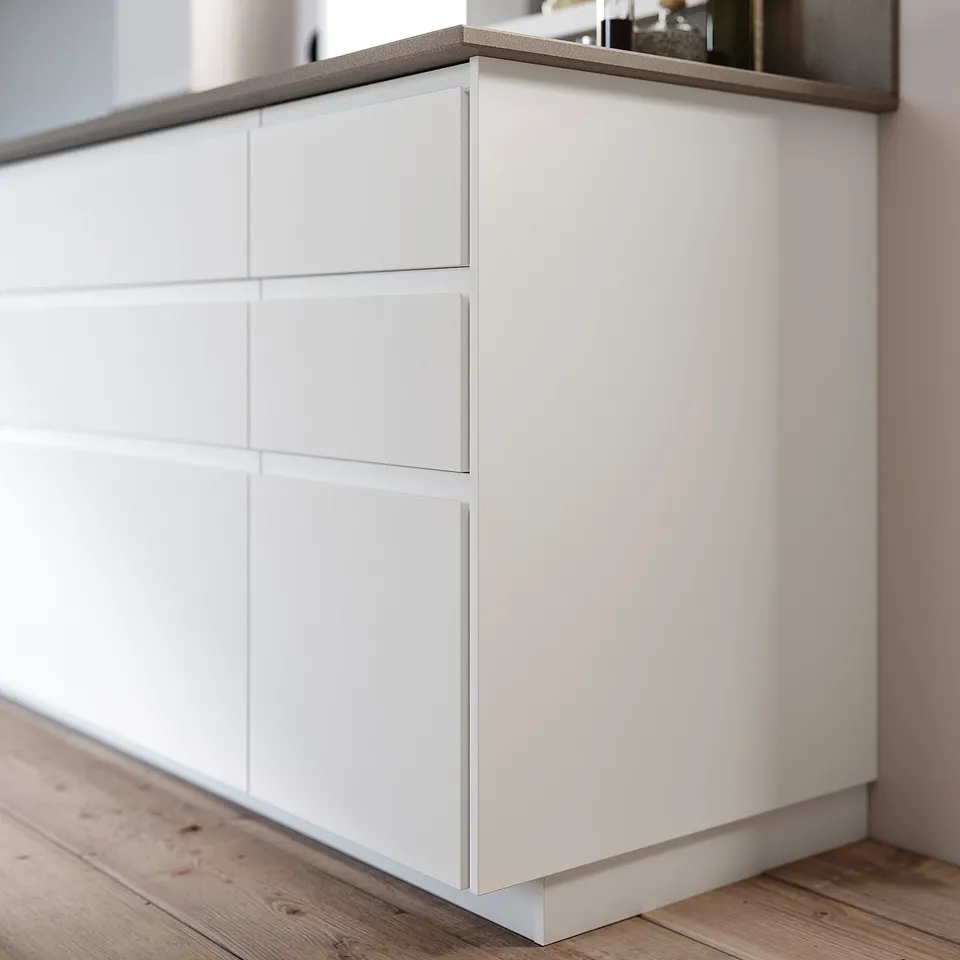 White FÖRBÄTTRA cabinet, 3 drawers, wood floor.