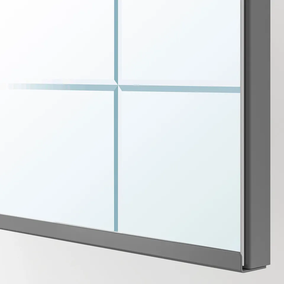 Close-up of modern, sleek wardrobe with clean lines and mirrored section.