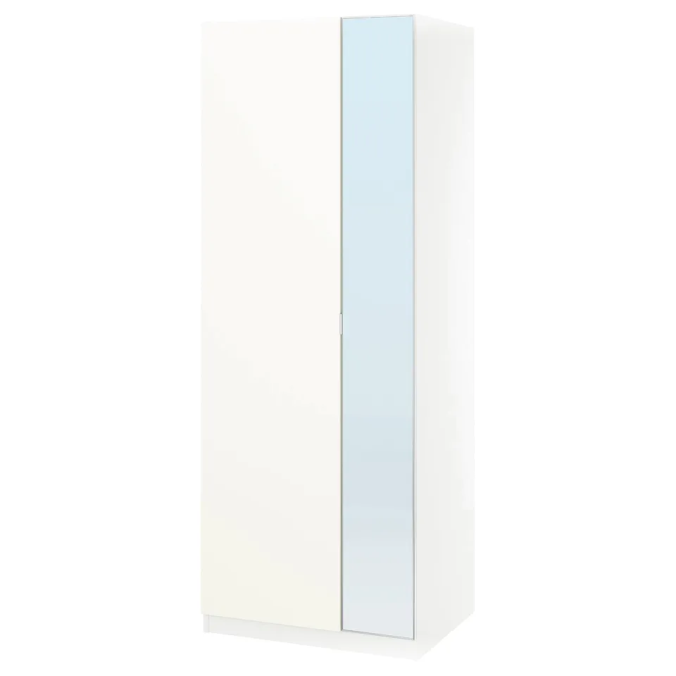 A white PAX wardrobe with mirrored doors, sleek and modern design, featuring soft-close hinges.