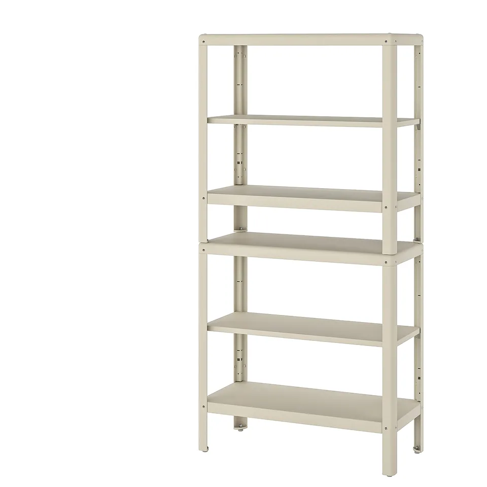 A KOLBJÖRN, a tall, beige steel shelving unit with five empty shelves against a white background.
