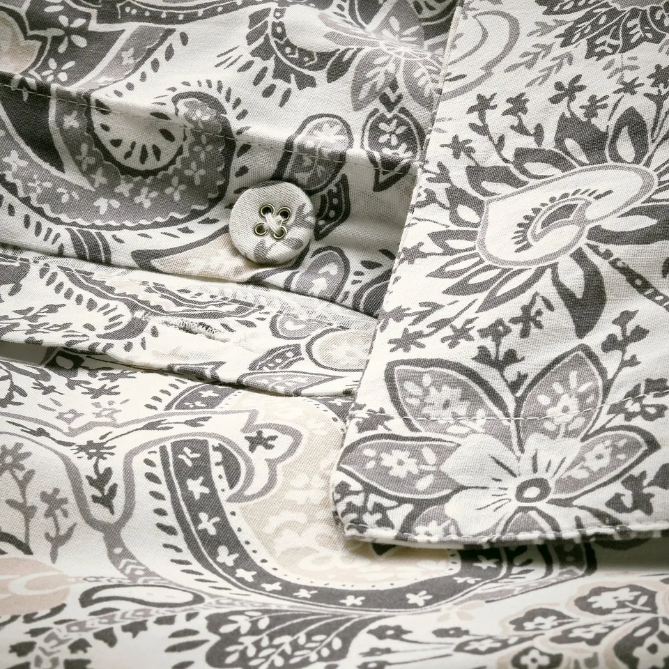Grey & white paisley pillowcase with button closure, soft cotton-viscose blend.