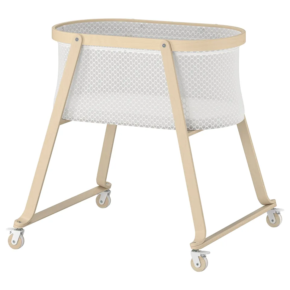 ÄLSKVÄRD beech bassinet with mesh sides, four wheels, modern design.