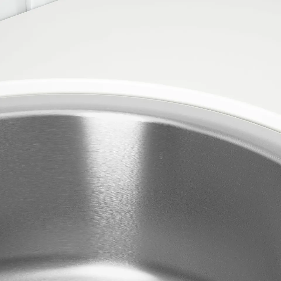 Stainless steel sink; smooth, reflective surface; high-quality finish.
