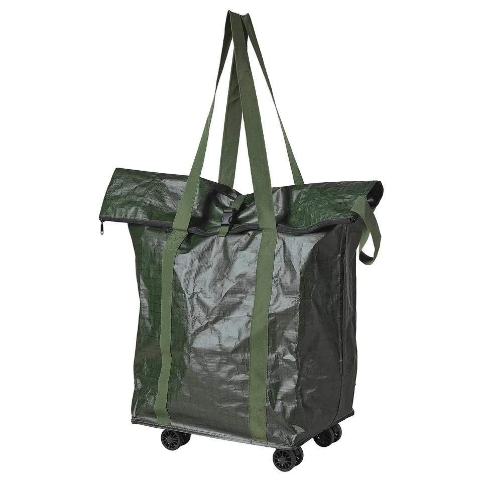 Green rolling shopping bag with long straps, four wheels, and foldable top.