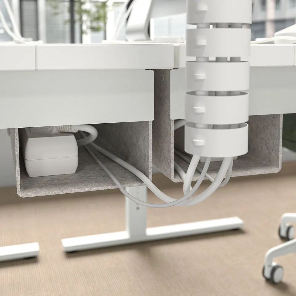 Desks cable management tray hides wires, keeping work area tidy. Height-adjustable for ergonomic comfort.