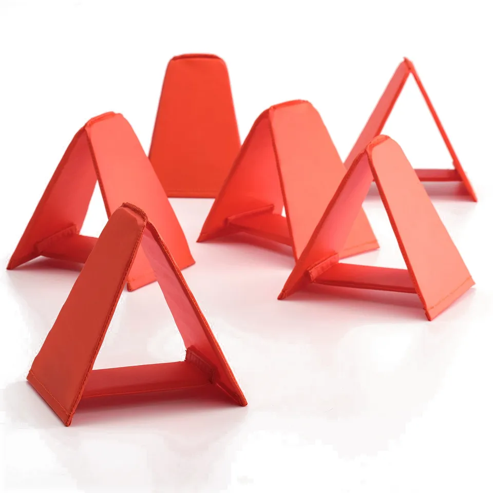Six red triangular agility cones arranged on a white surface, quality fabric construction, lightweight and soft.