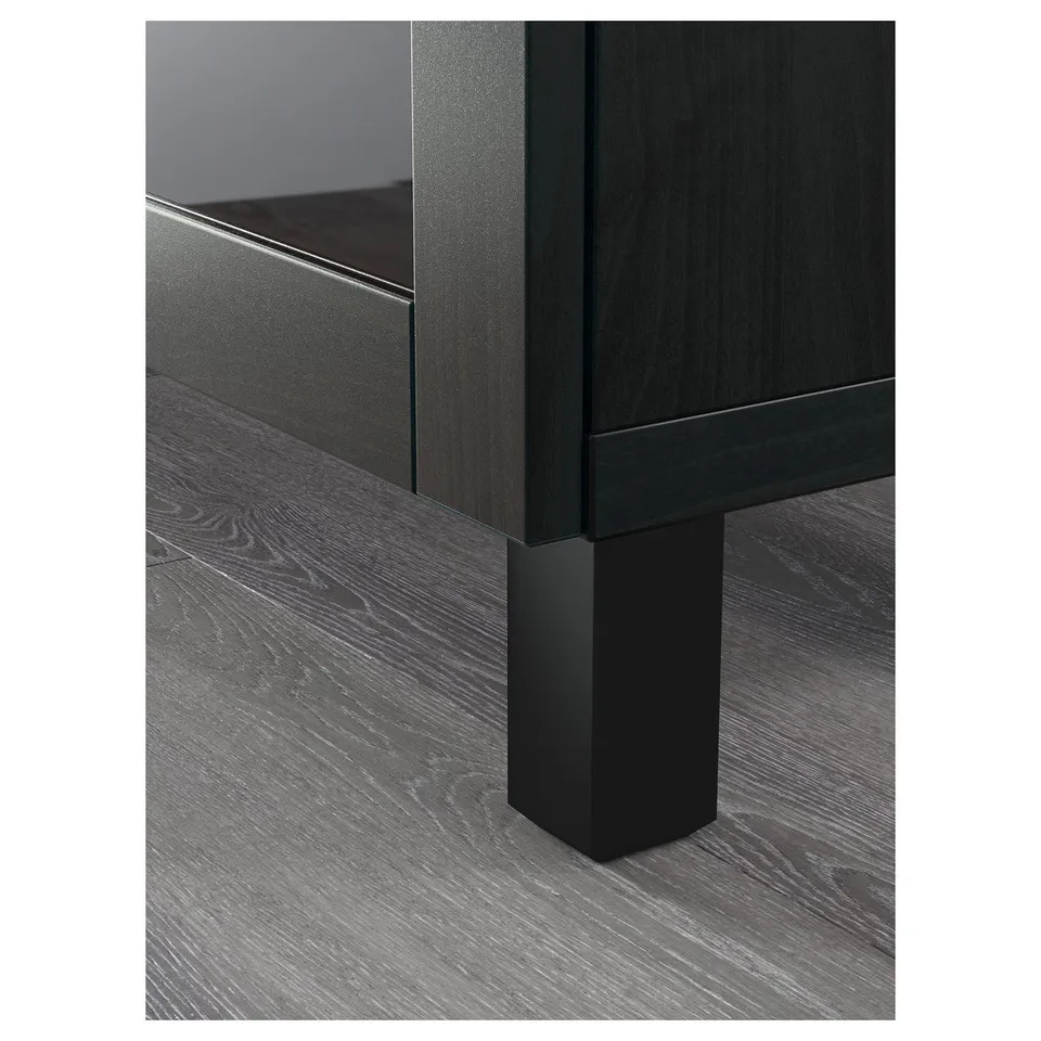 Modular storage furniture corner, exhibiting sleek design and sturdy build quality. Dark wood finish with clean lines and adjustable shelf.