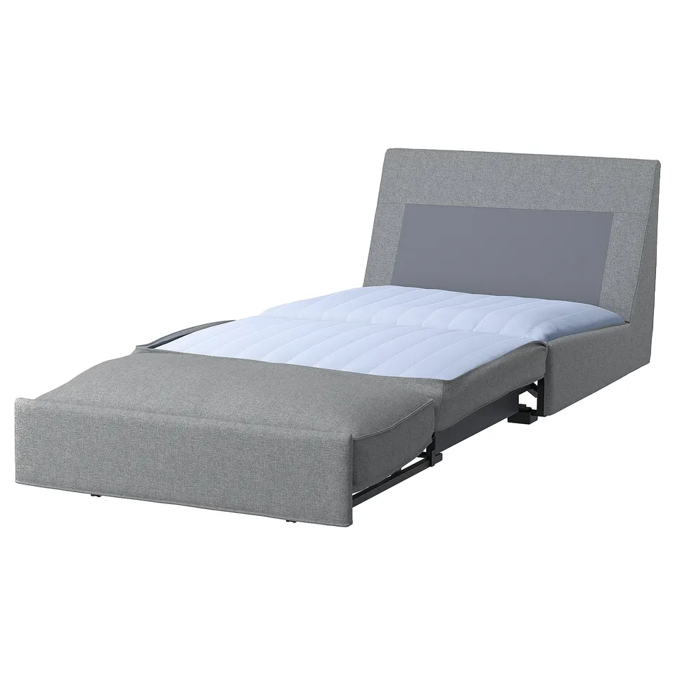 A grey KIVIK sofa-bed, designed for compact spaces, with a upholstered headrest, padded mattress, and sleek, modern lines.